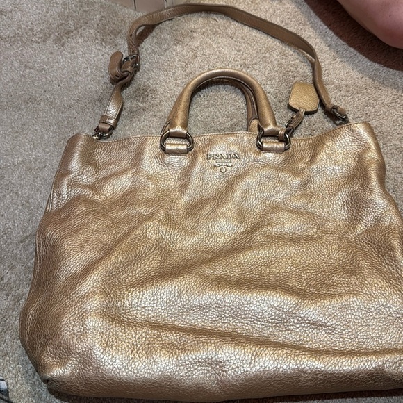 Prada Handbags - Prada tote bag with detachable crossbody strap in gold leather.